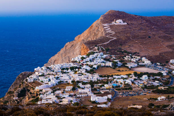 Chora on Folegandros island, Greece with beautiful Orthodox church of Panagia (Virgin Mary) on hill above.