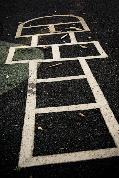 istock Dark and deserted playground with hopscotch on ground 96367828