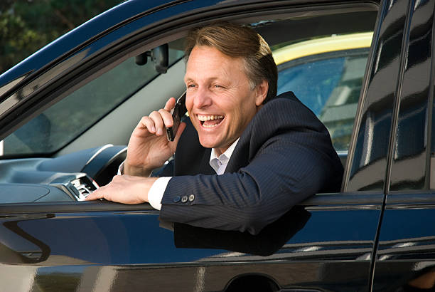 happy business in car stock photo