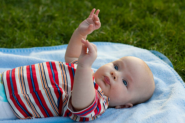 istock Beautiful baby lies on a coverlet 96370342