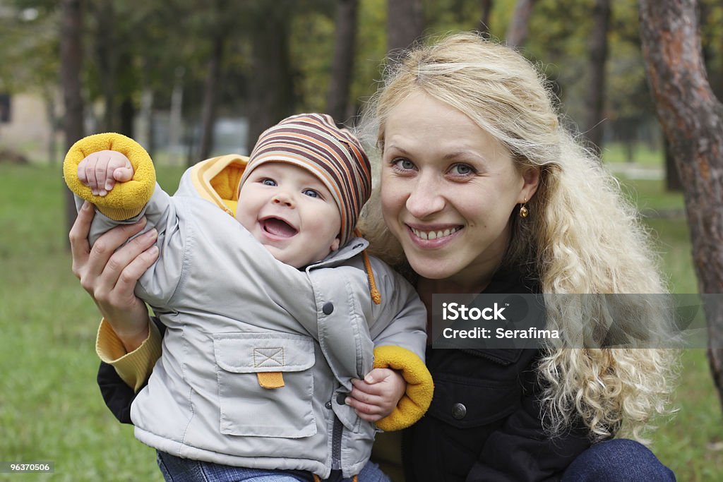 Mum with kid in park  20-29 Years Stock Photo