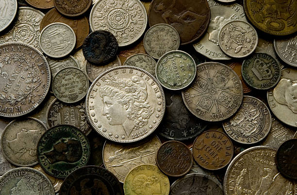 Old coins of different countries stock photo
