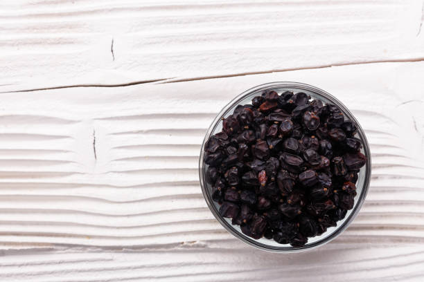 istock dried barberry berries on the rustic background 963717816