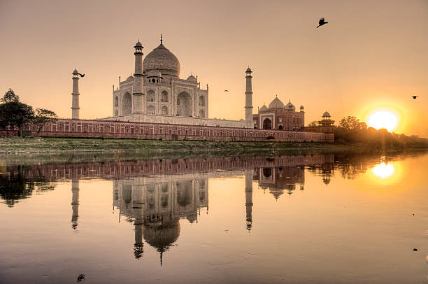 Taj Mahal and its reflection in Yamuna river, HDR stock photo