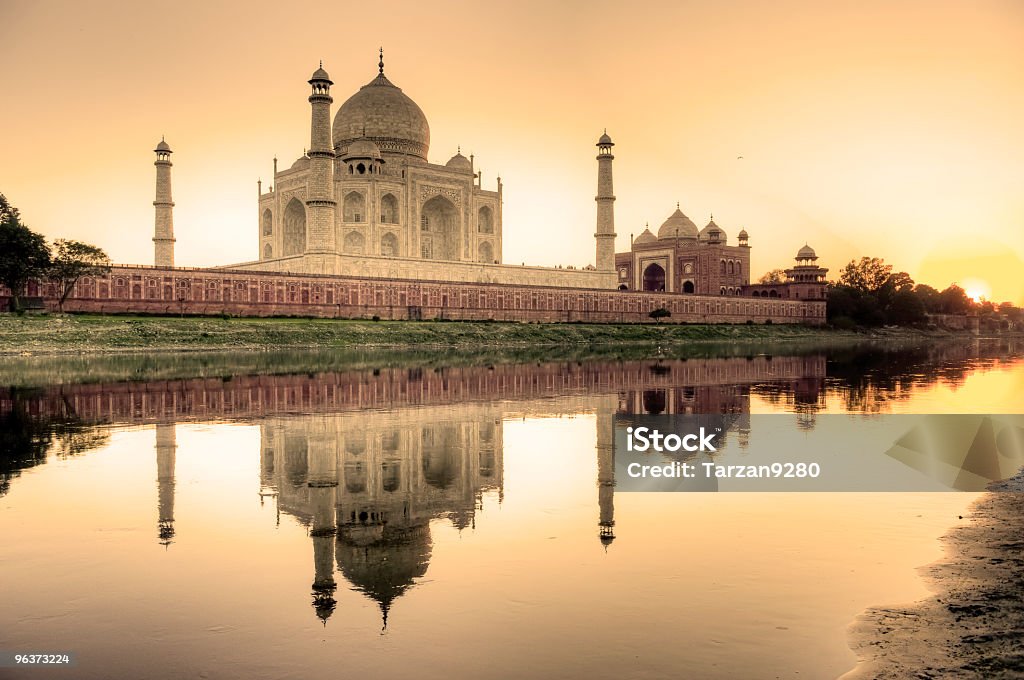 Taj Mahal reflected in the Yamuna river Taj Mahal and its reflection in Yamuna river, HDR Taj Mahal Stock Photo