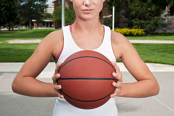 istock Confident Female Athlete with Basketball 96374106