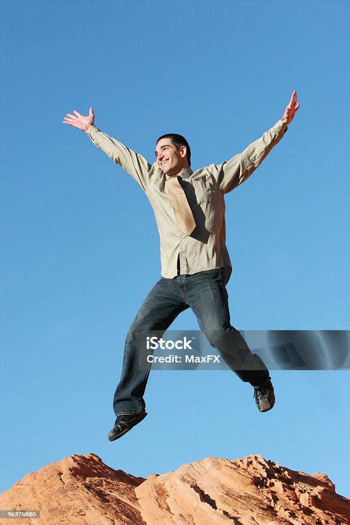 Homem de negócios feliz pulando - Foto de stock de Adulto royalty-free