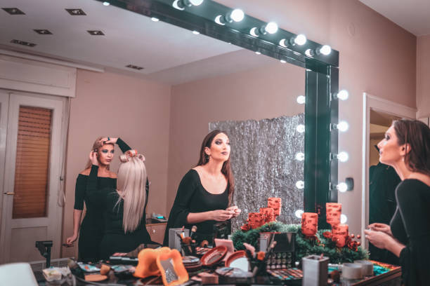 istock Best friends preparing for the night out at home 963771874