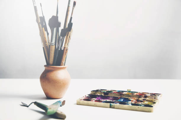 istock Painting brush and watercolor 963774882