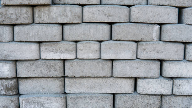 istock Pavement stones. Paving slabs. Cobblestone on pallets ready for use. 963798328