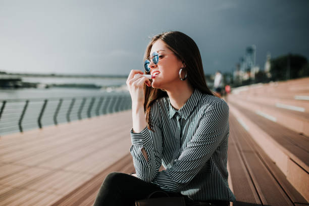 Charming girl by the river