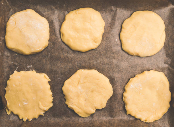 istock Home handmade baking, the dough on parchment paper 963811548