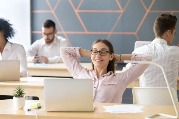 istock Happy student or employee enjoying break at workplace feeling relaxed 963814376