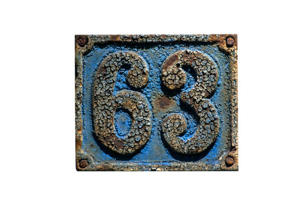 istock Old retro cast iron plate number 63 963818306