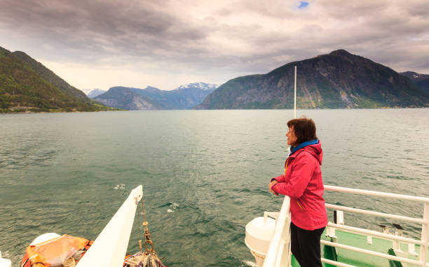 istock Tourist woman on liner in Norway 963828068