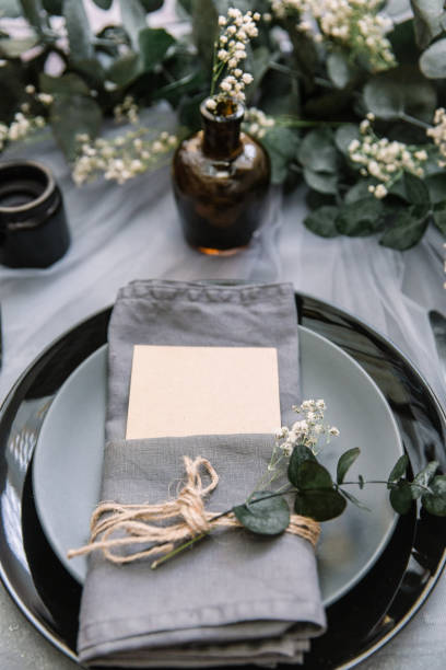 istock Wedding table decorations. Linen napkin with card for text 963828588