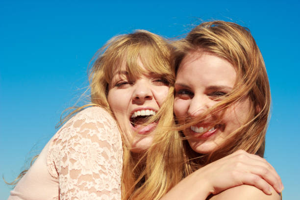 istock Two women best friends having fun outdoor 963828724