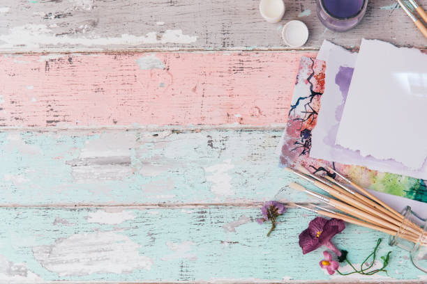 istock Artistic workspace, Brushes, paints, watercolor and a palette. Top view, flat lay. 963830962