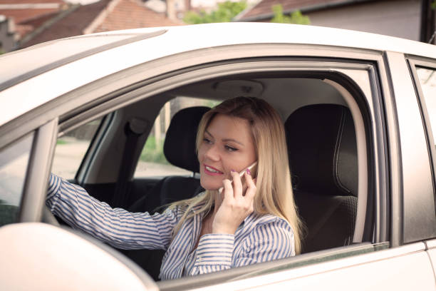 istock Woman driving a car . 963834186