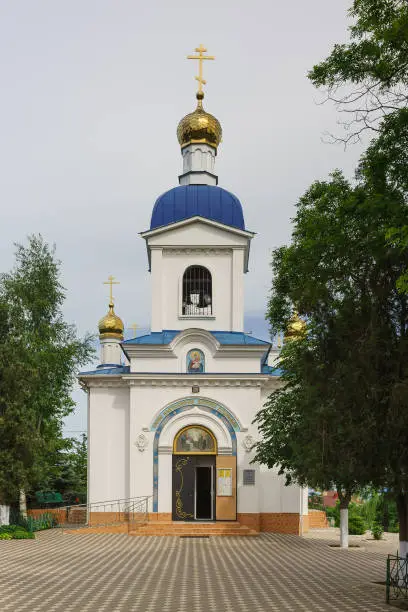 Entrance To the Church of the assumption of the blessed virgin in Kerch on Ulyanov street on a cloudy spring day. Vertical frame