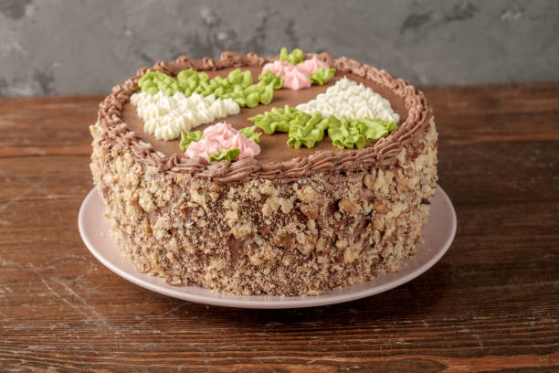 istock Homemade Kiev cake on old wooden table. 963854824
