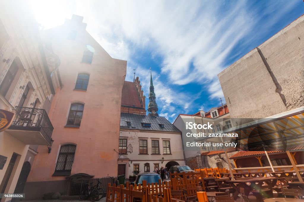 View on the old houses and church towers that are located in the city center of Riga. Latvia. RIGA, LATVIA - MAY 06, 2017: View on the old houses and church towers that are located in the city center of Riga. Latvia Architecture Stock Photo