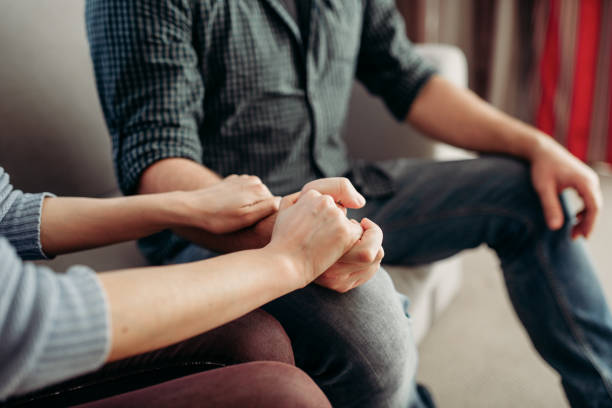 istock Couple hold hands, family psychology support 963865050