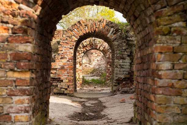 istock Maze ruins arched passage old building made of bricks 963882218