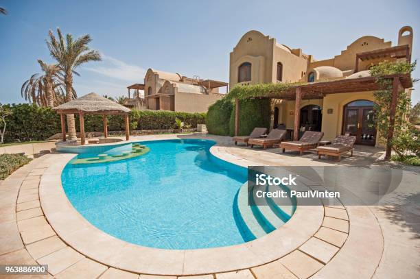 Swimming Pool At At Luxury Tropical Holiday Villa Resort Stock Photo - Download Image Now