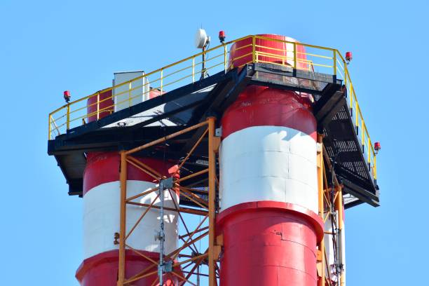 istock Modern industrial building with a high chimney 963896272
