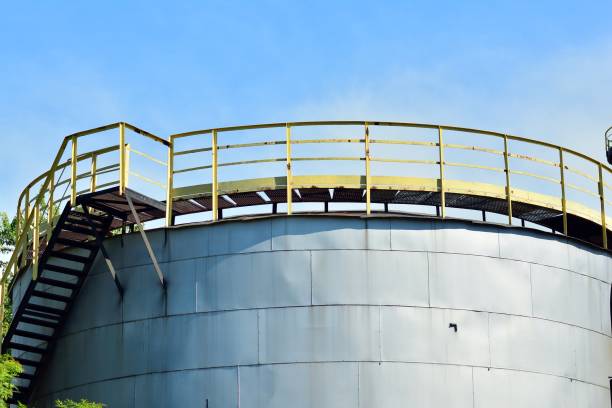 istock Modern industrial building with a high chimney 963896290