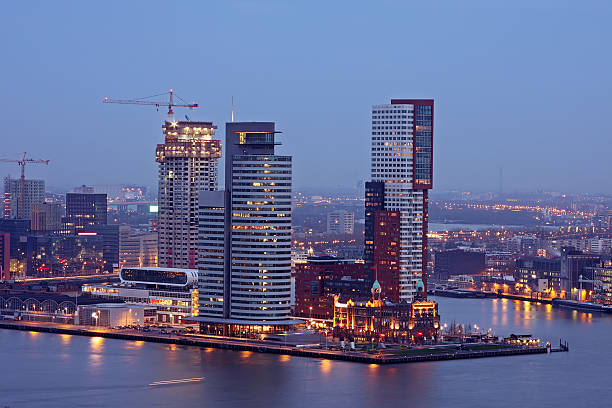 istock Modern office buildings by night in Rotterdam the Netherlands 96390299