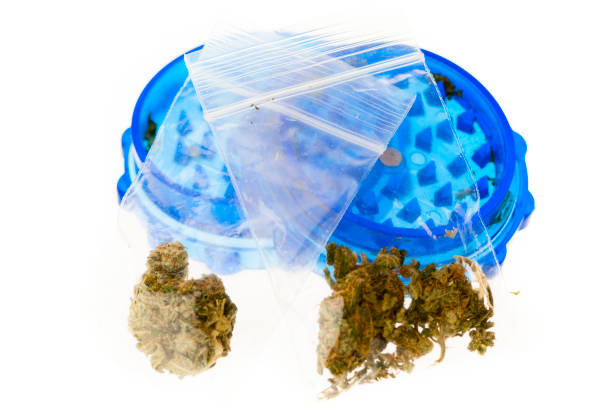 istock Bags of marijuana with a grinder. 963907942