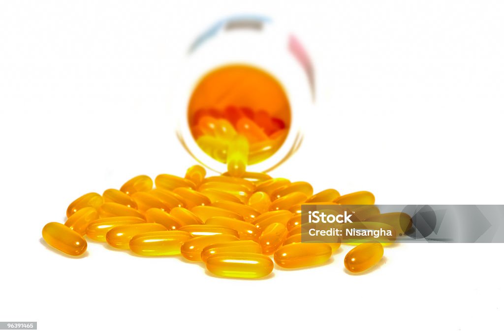 Omega Three pills isolated on white  Bottle Stock Photo