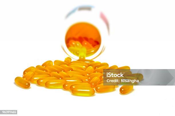 Omega Three Pills Isolated On White Stock Photo - Download Image Now - Bottle, Bunch, Capsule - Medicine