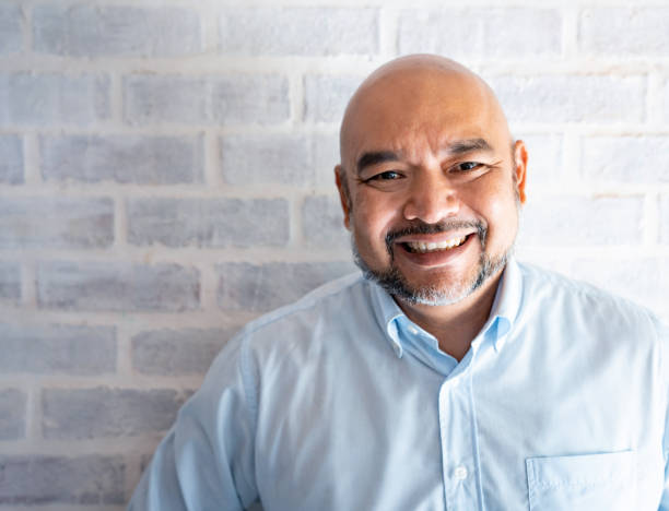 istock Malaysian man looking very happy 963916592