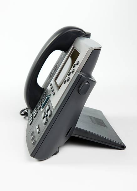 Buisness VoIP Phone Isolated on White  telephone voip dust internet stock pictures, royalty-free photos & images