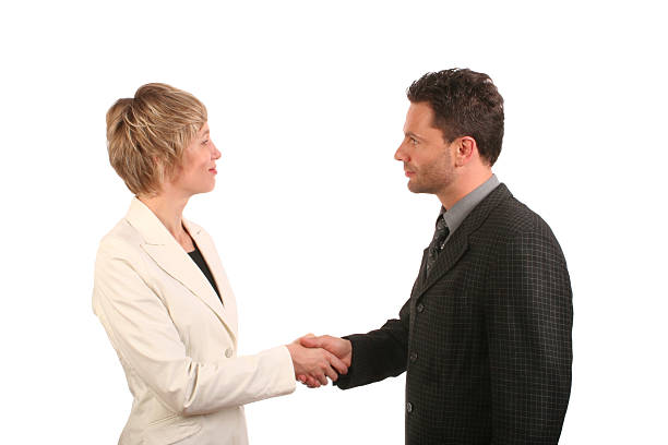 istock Man and woman business handshake 96396032