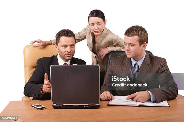 Group Of 3 Business People Working Together With Laptop Stock Photo - Download Image Now