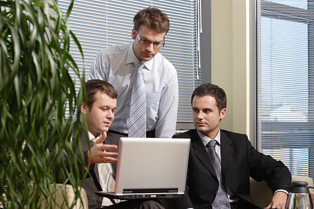 istock Young business men working with latop in office 96396993