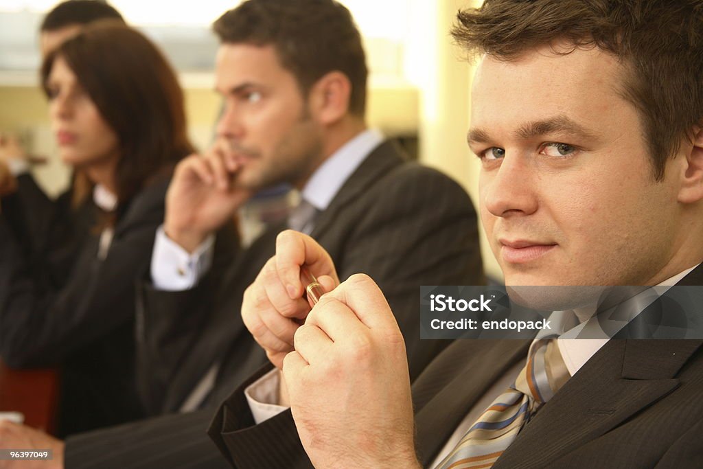 Quatro pessoas de negócios em uma conferência - Royalty-free Adulto Foto de stock
