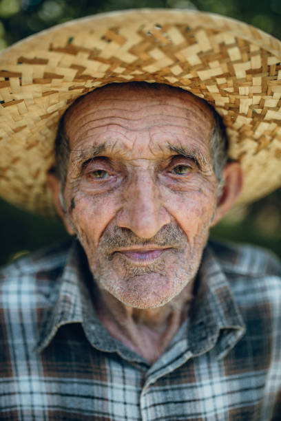 istock Portrait of old man with hat 964005574