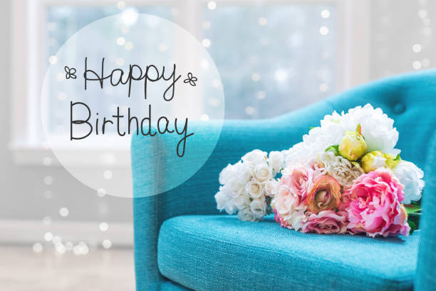 istock Birthday message with flower bouquets with chair 964005690
