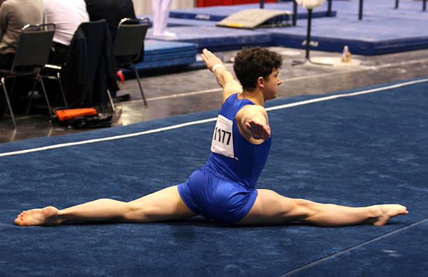 Gymnast on floor stock photo