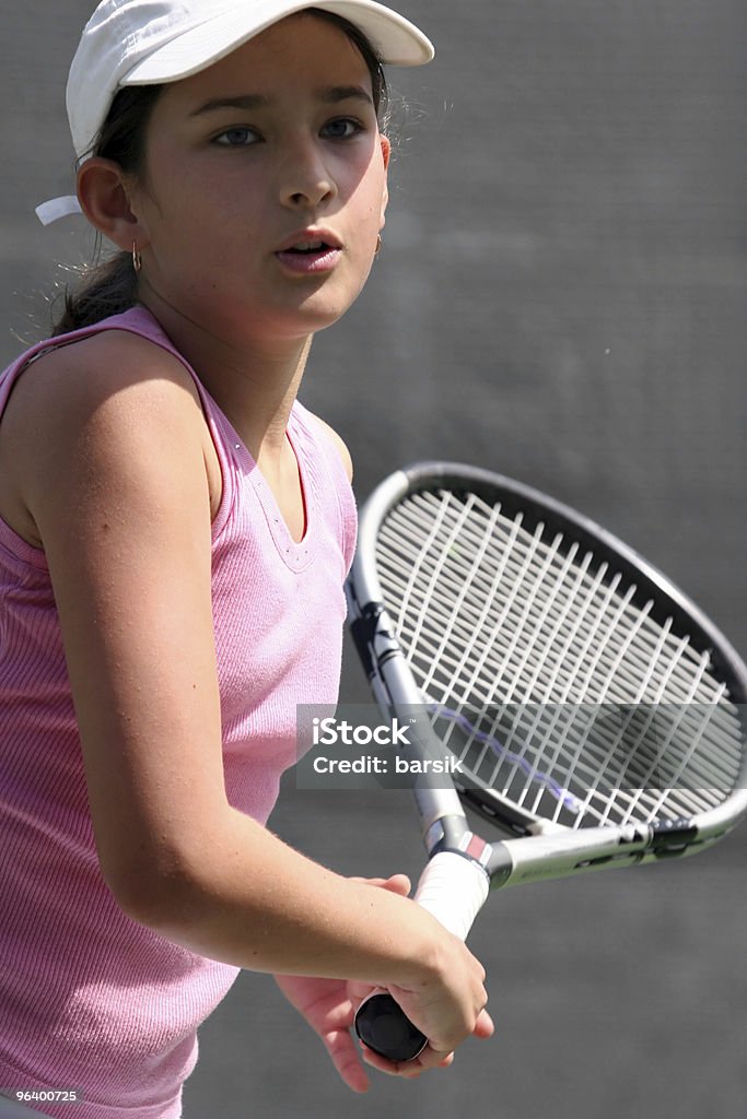 Niña jugando al tenis - Foto de stock de Actividad libre de derechos