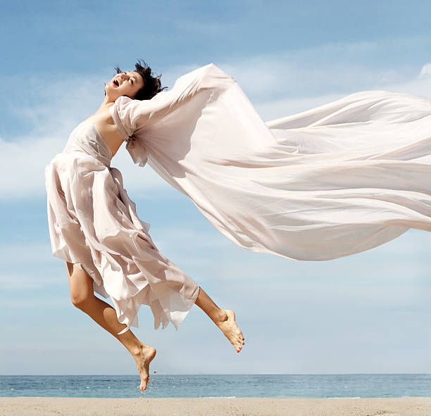 istock Happy woman on the beach 96401742