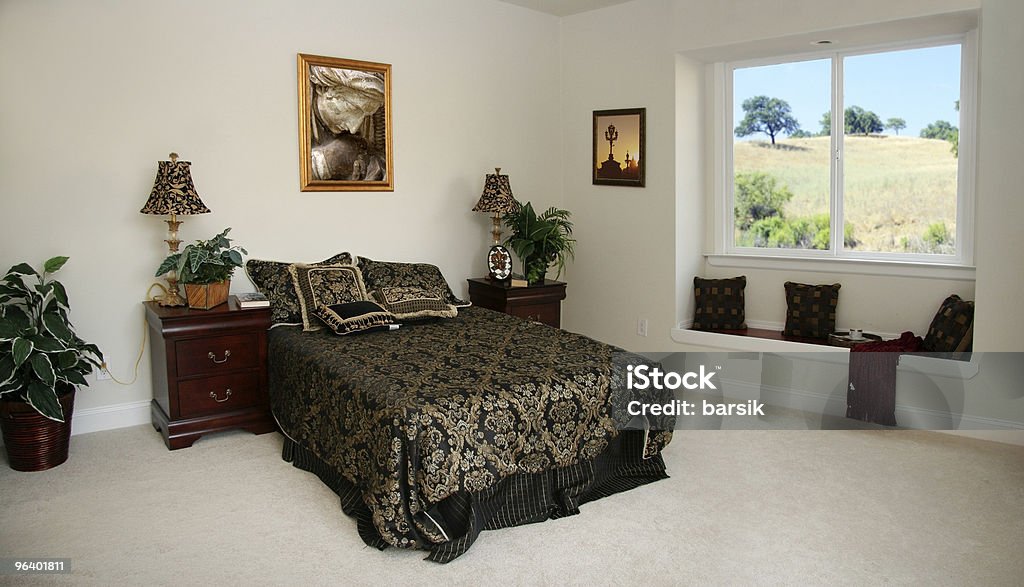 Spacious bedroom  Bedding Stock Photo