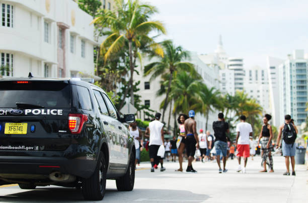 Miami - May 27, 2017: Young people flock to Ocean Drive in South Beach to celebrate the annual Urban Beach Week, a contentious event that attracts a heavy police presence during Memorial Day Weekend.
