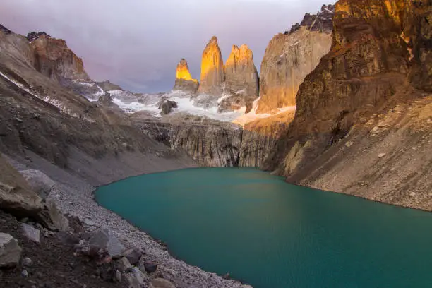 Torres del  Paine National Park, maybe the best sunrise in the world! and without seeing the sun! The first rays iluminate the towers with an incredible orange.