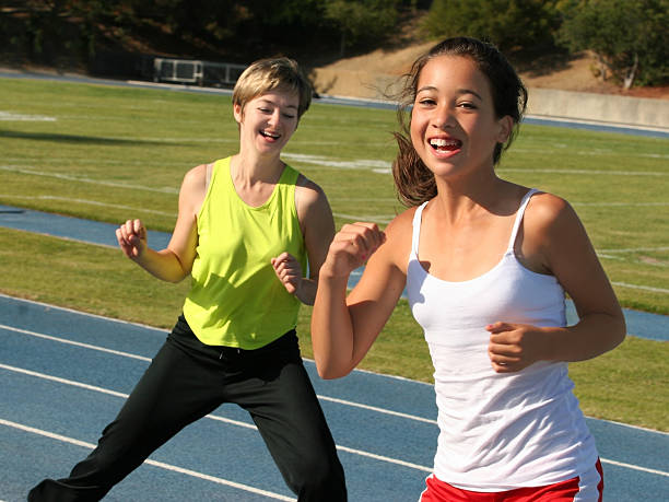istock Mother and daughter exercising 96402151
